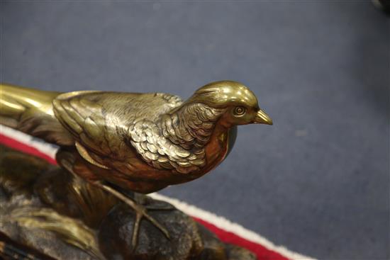 R. Pollin. A French Art Deco patinated bronze model of a pheasant, width 26in.